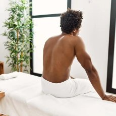 Male waxing and massage therapist